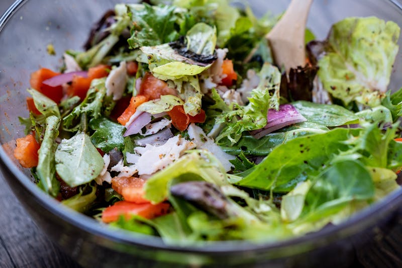 Fresh colorful salad bowl at Dions restaurant